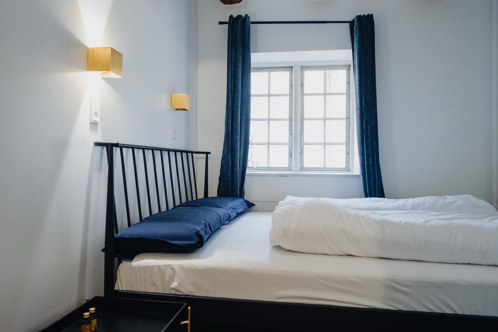 Quarto Duplo com Banheiro Compartilhado