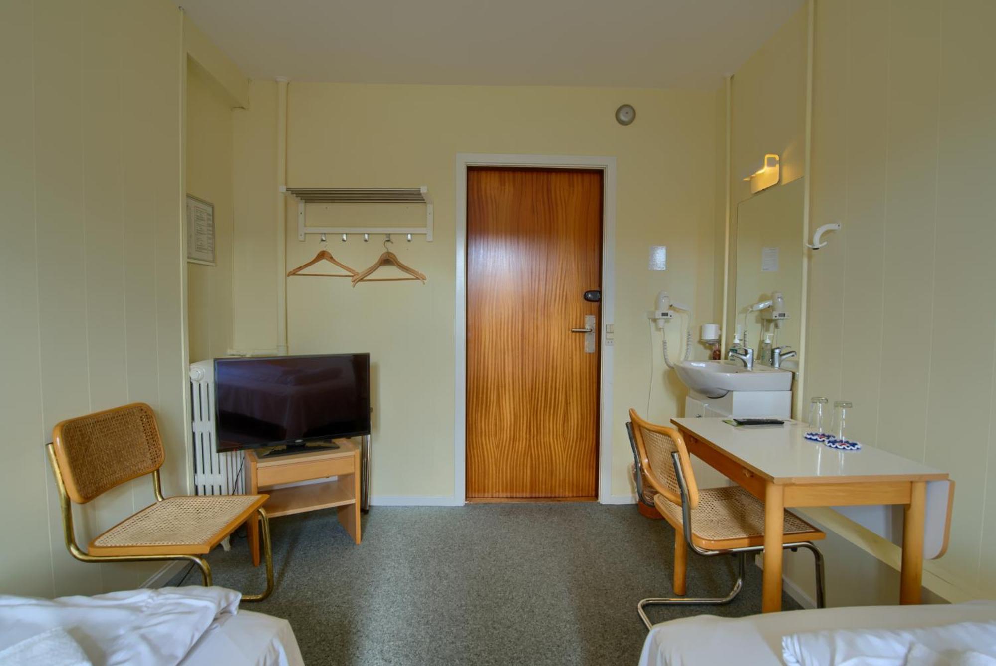 Double Twin Room with private toilet and bath opposite room