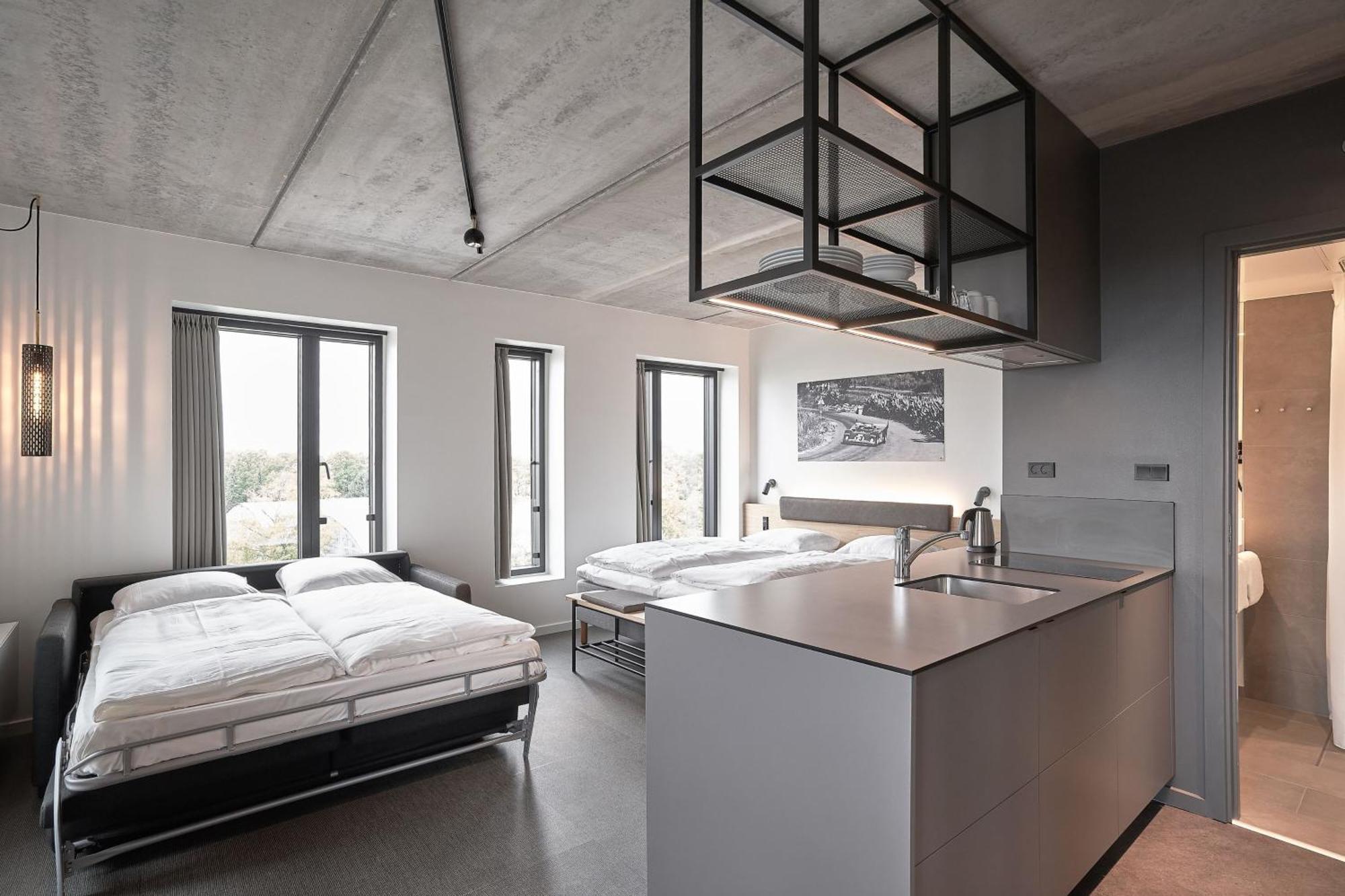 Larger Family Studio with One King and One Non-Private Sofa Bed